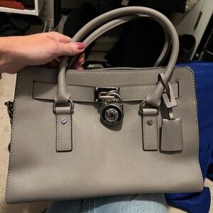 Michael Kors grey purse.No rips, stain or discrepancies. Smoke and pet free home